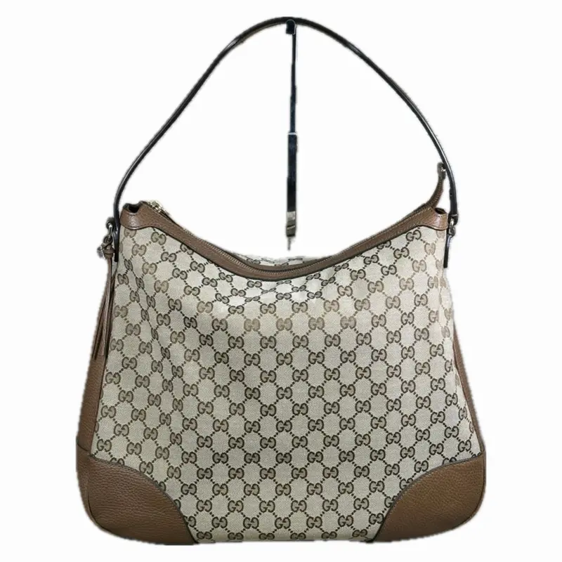 Gucci Bree Hobo Bag In Gg Canvas And Premium Leather 1